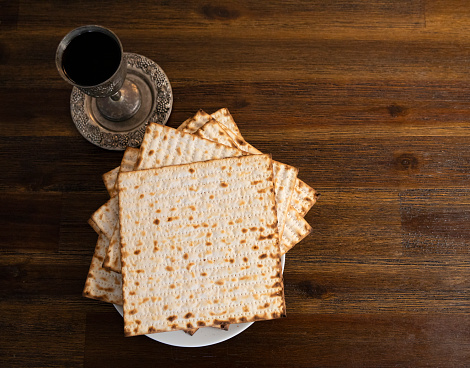Matzo and Kiddush Cup on the table for Passover celebration