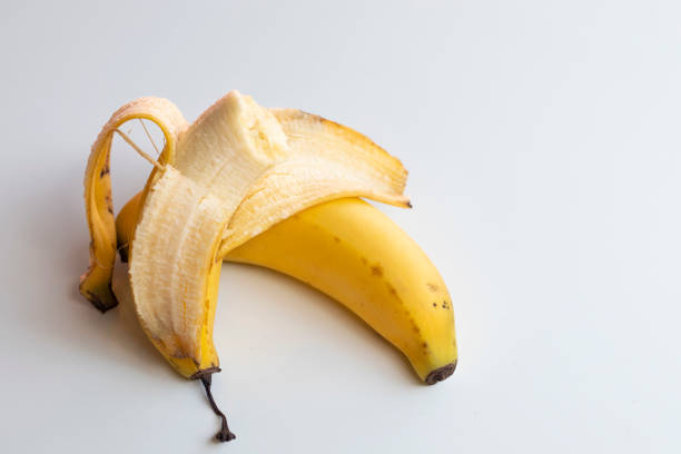 istock Ripe yellow bananas Isolated on white background 1302899778