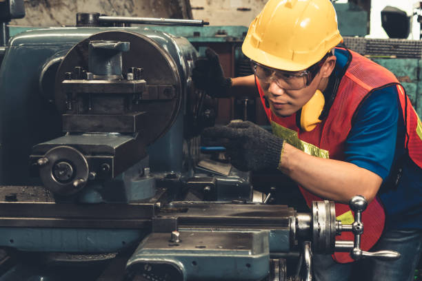 istock Skillful factory worker or engineer do machine job in manufacturing workshop 1302901291