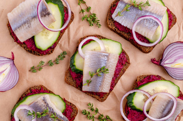 istock Sandwich with vegetables and herring 1302902530