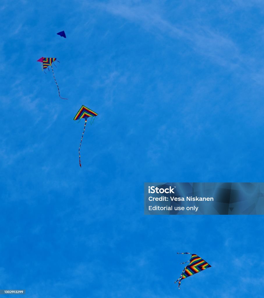 Row of kites Row of kites fly over Beijing during Chinese new year 2021. Flying kites are especially famous with old men. They often gathering some open area and try who can fly kite higher than others. Backgrounds Stock Photo Row of kites Row of kites fly over Beijing during Chinese new year 2021. Flying kites are especially famous with old men. They often gathering some open area and try who can fly kite higher than others. Backgrounds Stock Photo