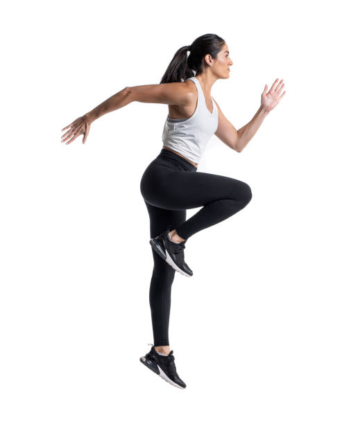 istock Female on sprinting mode on white background 1302915409