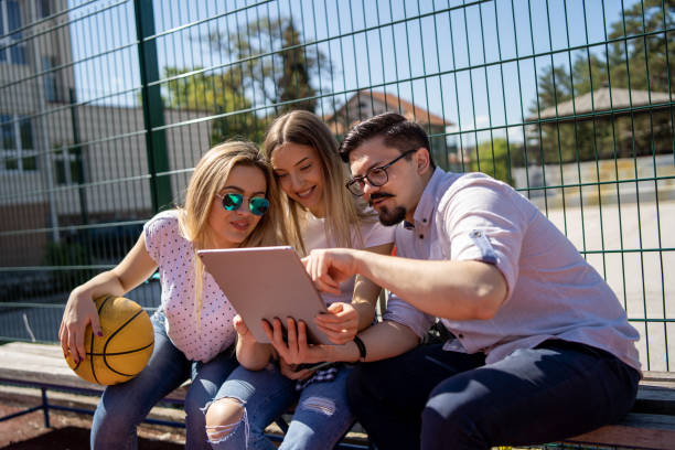 istock Young friends having fun outdoors 1302917919