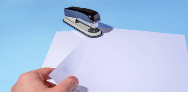 istock Stapler. Thematic concept photo for Office, Paper and Document working. 1302921355