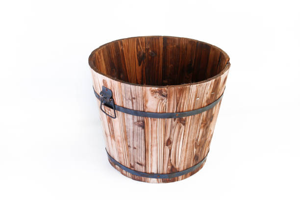 istock wooden bucket on white 1302926950