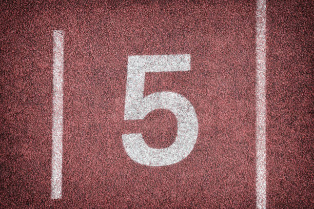 istock number five on a red athletics ash running track and field 1302928895