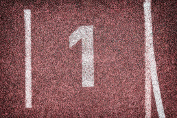 istock number one on a red athletics ash running track and field 1302929015