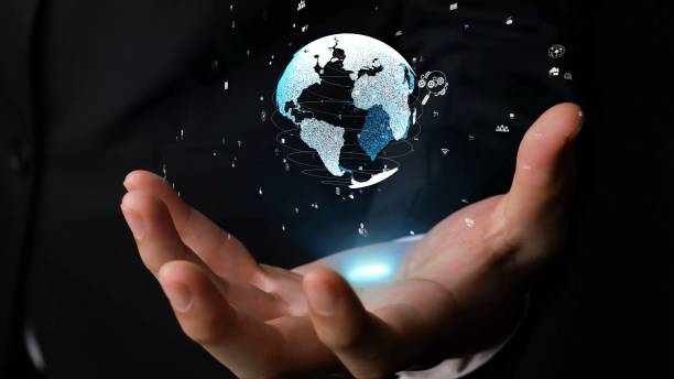 istock Human hand holding earth globe holographic technology 1302929837