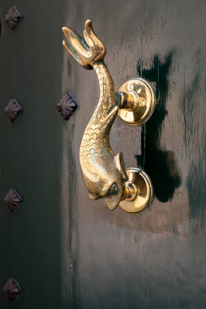 Vintage door handle in shape of dolphin, Rabat, Malta