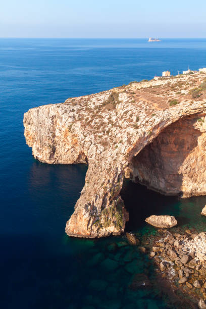 istock Blue Grotto, Malta. Coastal landscape with natural stone arch 1302929883
