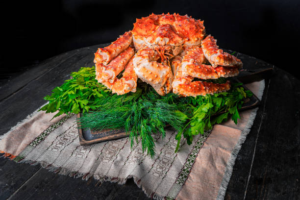 istock Tasty king kamchatka crab with lemon slices 1302929975