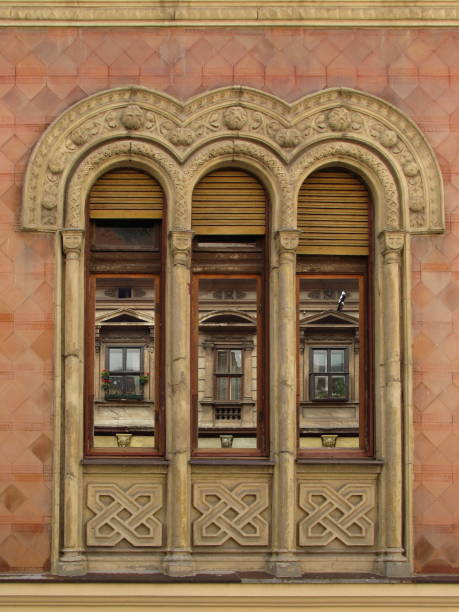 istock Three windows with reflection from the other side of the street 1302930166