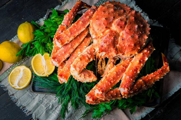 istock Tasty king kamchatka crab with lemon slices 1302931302