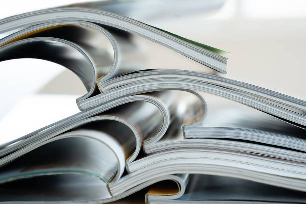istock publication Newspaper and journal books background and catalog design article magazine press Newspaper with tablet 1302937906