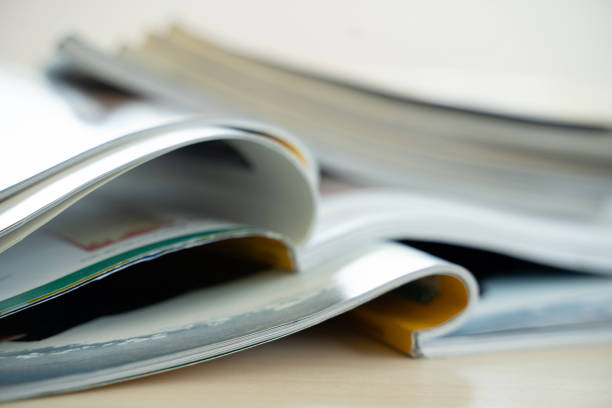 istock publication Newspaper and journal books background and catalog design article magazine press Newspaper with tablet 1302937908