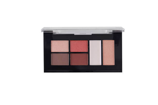 istock Eyeshadow shades from beige to brown in grid patern container 1302938850