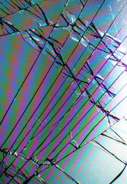 istock Broken glass texture. Close up photo. 1302939054