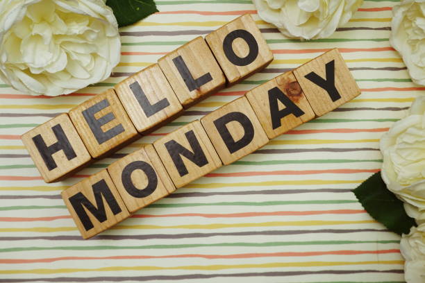 istock Hello Monday alphabet letters on colorful stripes background 1302939487
