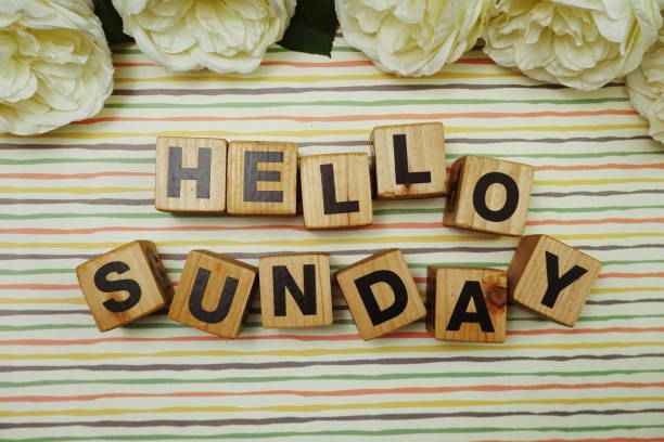 istock Hello Sunday alphabet letters on colorful stripes background 1302940113