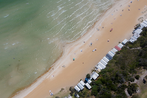Aerial image captured at Mt Martha, Victoria on the Mornington Peninsula, Victoria on a beautiful summer's day featuring iconic beach huts.