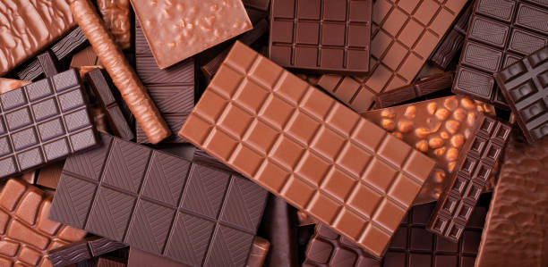istock milk dark chocolate bars, tasty food background 1302940582
