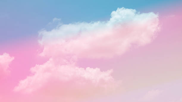 istock beauty soft pink sweet pastel with fluffy clouds on sky. multi color rainbow image. abstract fantasy growing sweet light 1302941693