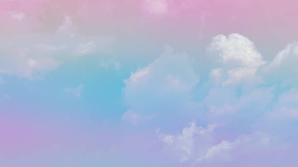 istock abstract beauty soft pink sweet pastel with fluffy clouds on sky. multi color rainbow image. abstract fantasy growing sweet light 1302941781