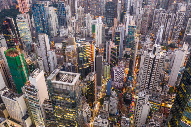 Aerial view of the overcrowded Central business district in Hong Kong island mixing office buildings and tall apartment towers in Sheung Wan. stock photo