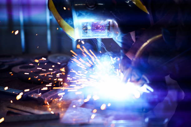 istock Industrial Welder With Torch 1302944573