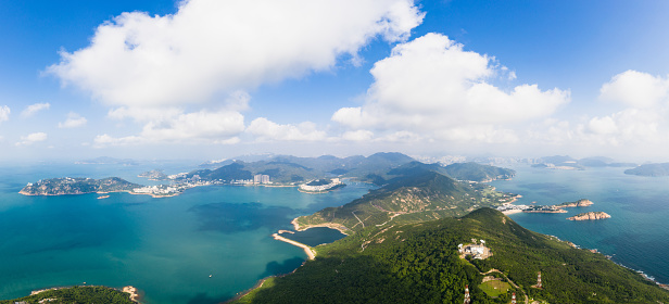 Aerial panorama of the famous Dragon's back hiking trail in the mountain of Hong Kong island with the Stanley peninsula in the background in Hong Kong SAR, China