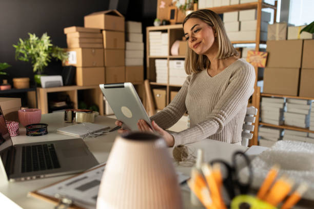 istock Female business owner starting a work video call over digital tablet 1302947262