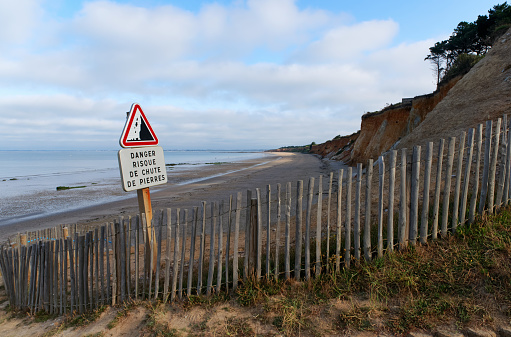 Bournemouth, UK. 22 May 2023. Warning sign about goats on the coast in Bournemouth in Dorset