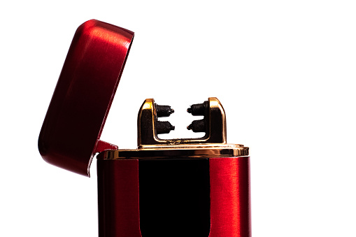 Red electronic lighter isolated on a white background close up