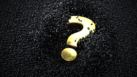 A golden question mark falls into the black sand. 3d illustration.