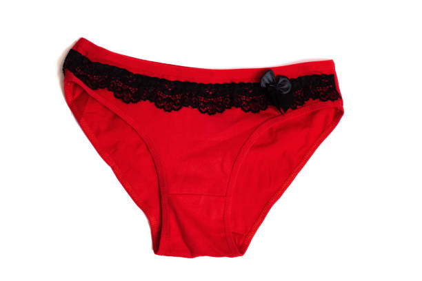 istock Red female underpants with black lace isolated on white 1302951278
