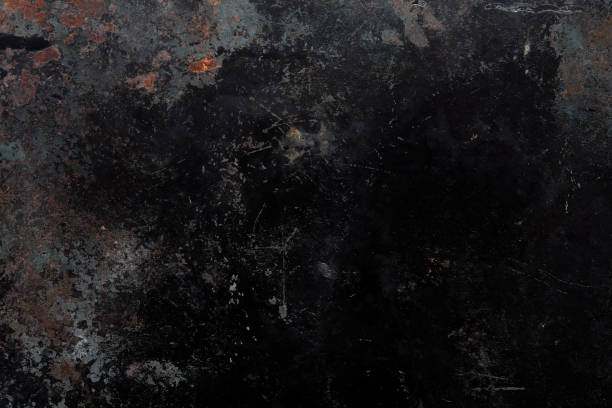 istock Black, corroded metal texture background with rusty parts 1302952413
