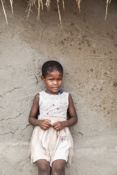istock Small African village girl 1302956661