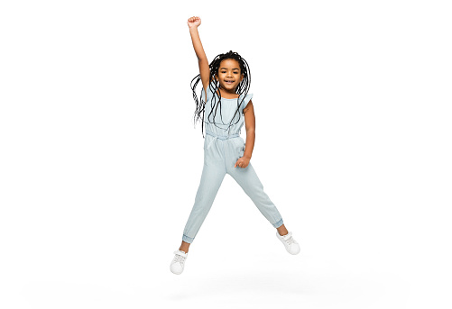 Happy longhair brunette little girl isolated on white studio background with copyspace for ad. Looks happy, cheerful, sincere. Childhood, education, human emotions, facial expression concept.