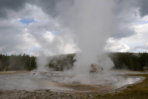 Giant Geyser at Old Faithful geothermal area in Yellowstone National Park, Wyoming, USA Geothermal feature in western Yellowstone upper geyser basin stock pictures, royalty-free photos & images