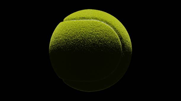 istock Tennis ball on black background. 1302964977