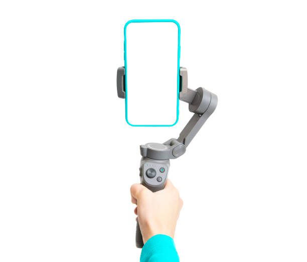 istock Phone gimbal stabilizer in woman's hand isolated on white background. 1302967073