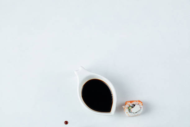 istock A sushi roll with cream cheese served with soy sauce 1302967239