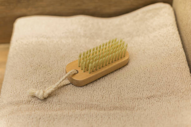istock In bathroom towel and scrubbing brush 1302968191