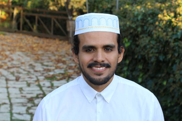 istock Islamic man wearing traditional embroidery hat 1302969487
