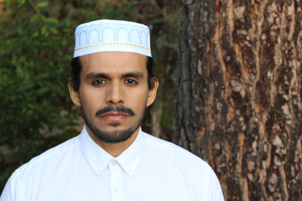 istock Islamic man wearing traditional embroidery hat 1302969658
