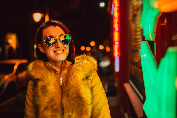 istock Woman and neon light 1302970581