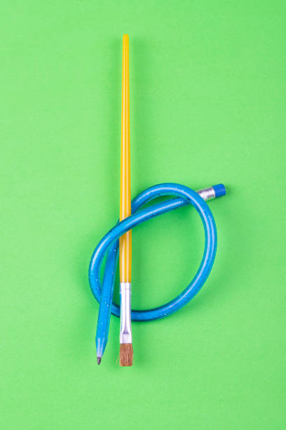 istock Pencil with paint brush 1302971758