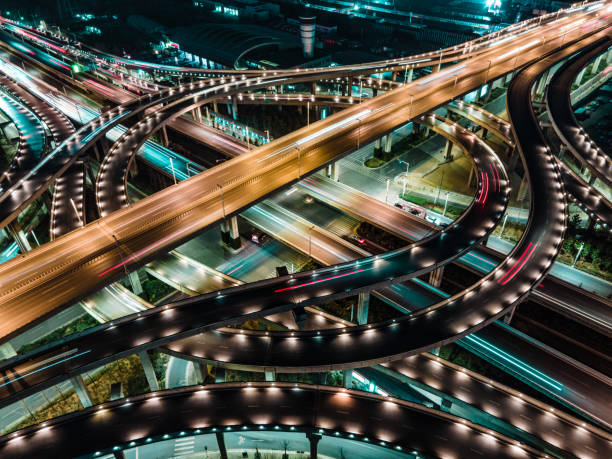 istock Aerial view highway overpass at night 1302973803
