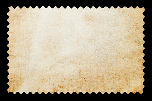 Blank postage stamp isolated on black background