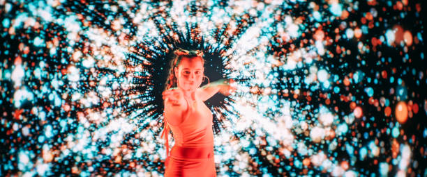 istock Beautiful dancer performing on projection background. Digital sparks 1302979081